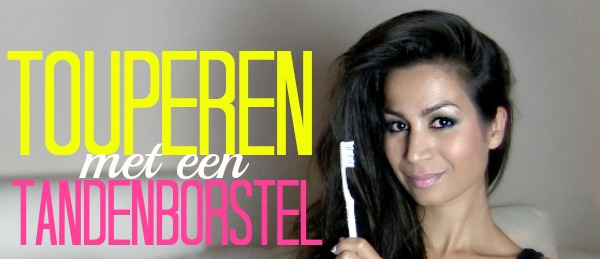 Touperen met een tandenborstel